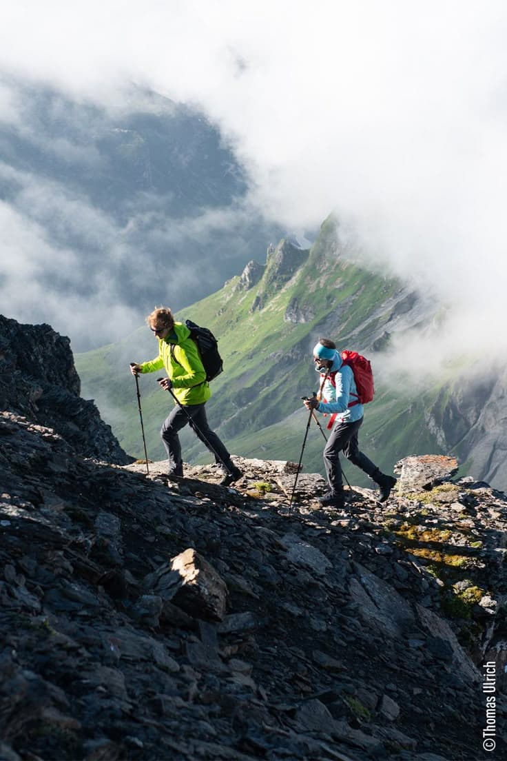 Hikers trekking on a mountain trail